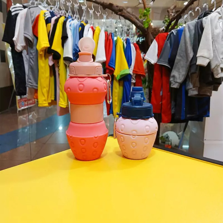 خرید قمقمه تاشو درچهار رنگ و طرح توت فرنگی و آناناس